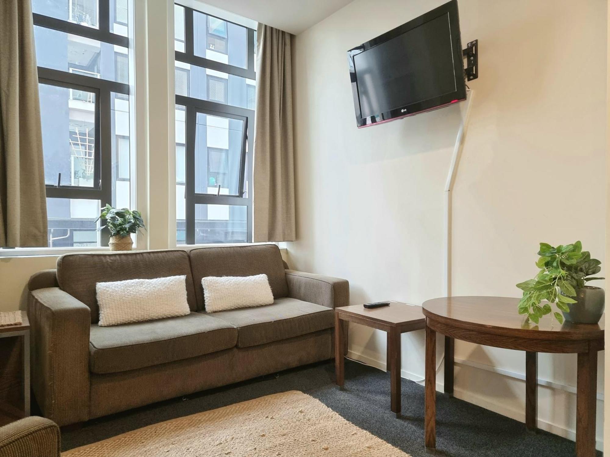 Urban Deco Apartment On Queen Street Auckland Zimmer foto